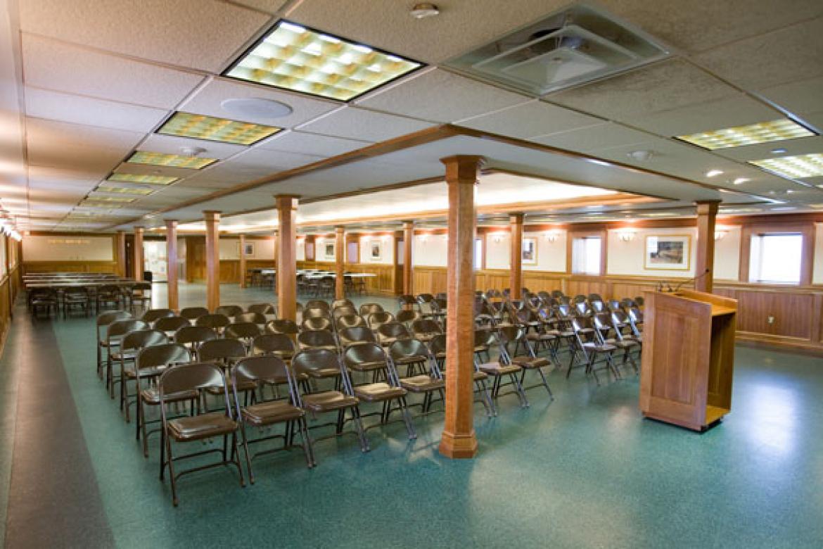 Gorham Hall with chairs and a podium