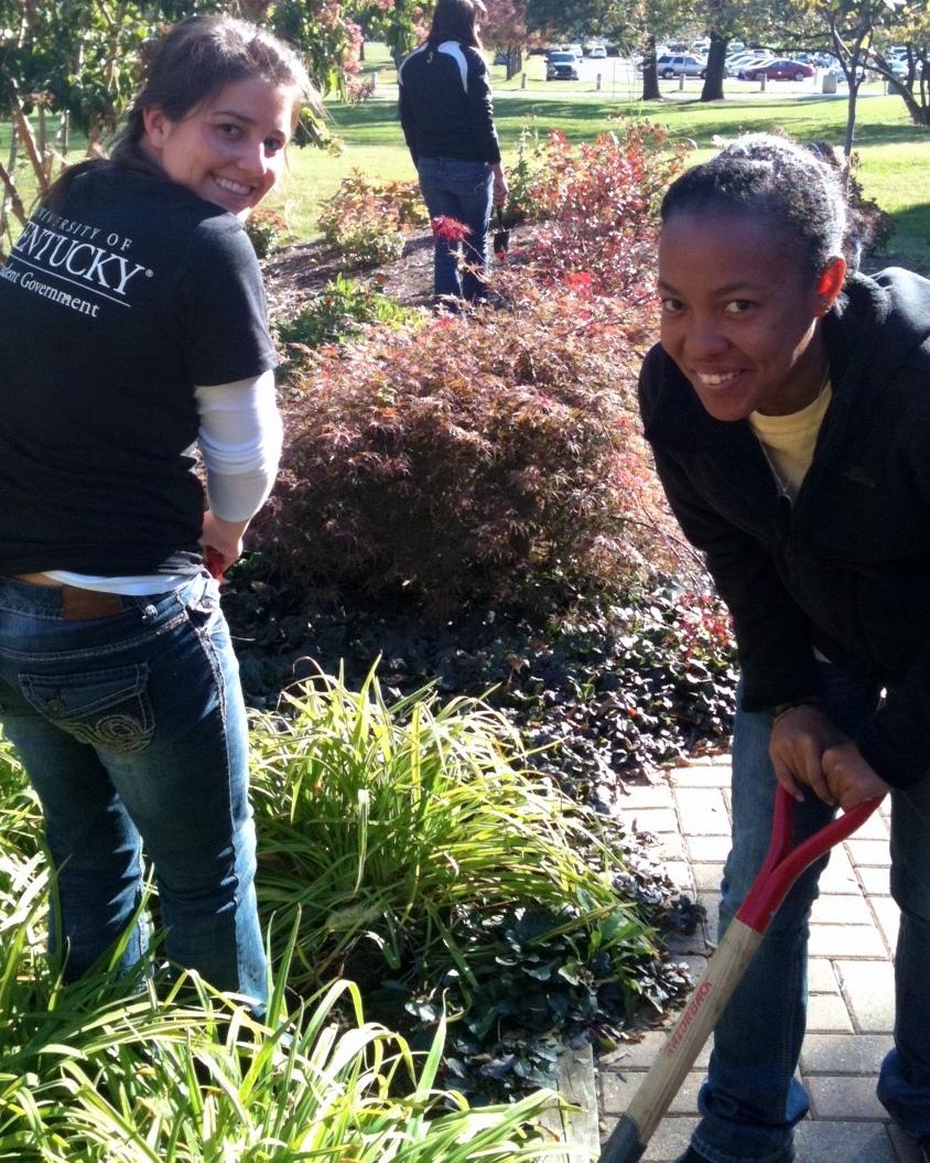 students smiling in garden